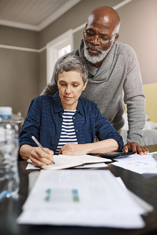 Professional smiling while reviewing tax-advantaged health savings
